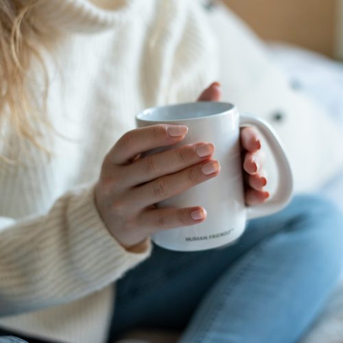 Hands holding a hot drink Hands holding a hot drink